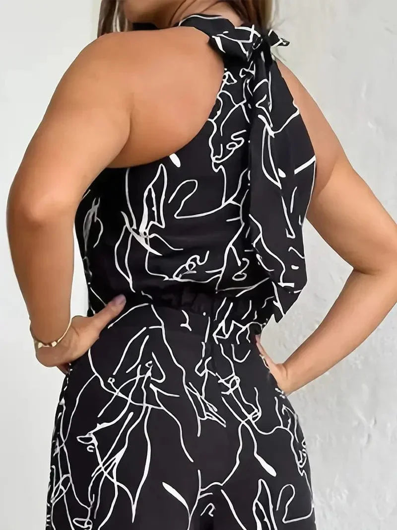 Stylish sleeveless pantsuit with modern print and high waist belt for wide-leg legs, for a fashionable and unique look