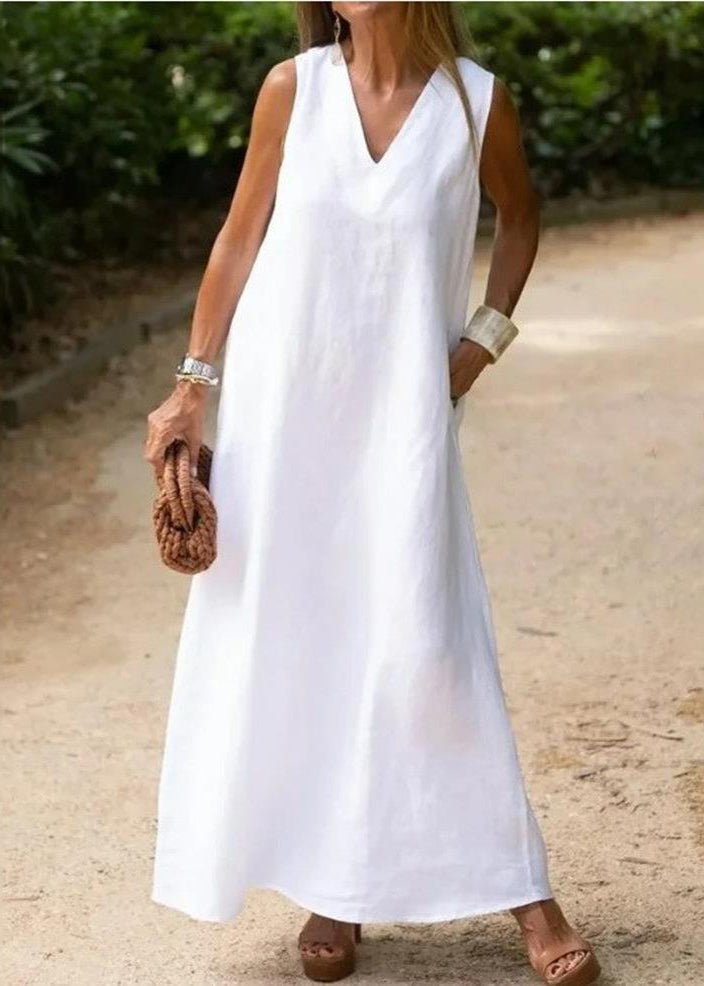 Elegant bohemian white cotton dress with V neckline and A-line hem sleeveless for a luxurious style