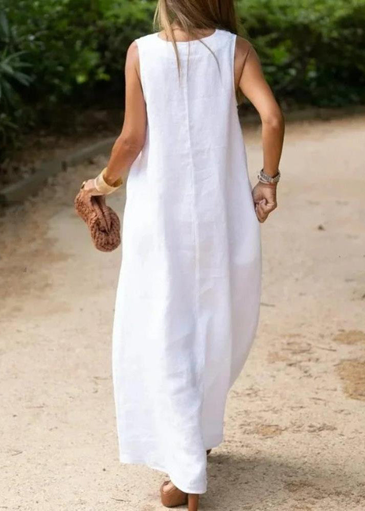 Elegant bohemian white cotton dress with V neckline and A-line hem sleeveless for a luxurious style