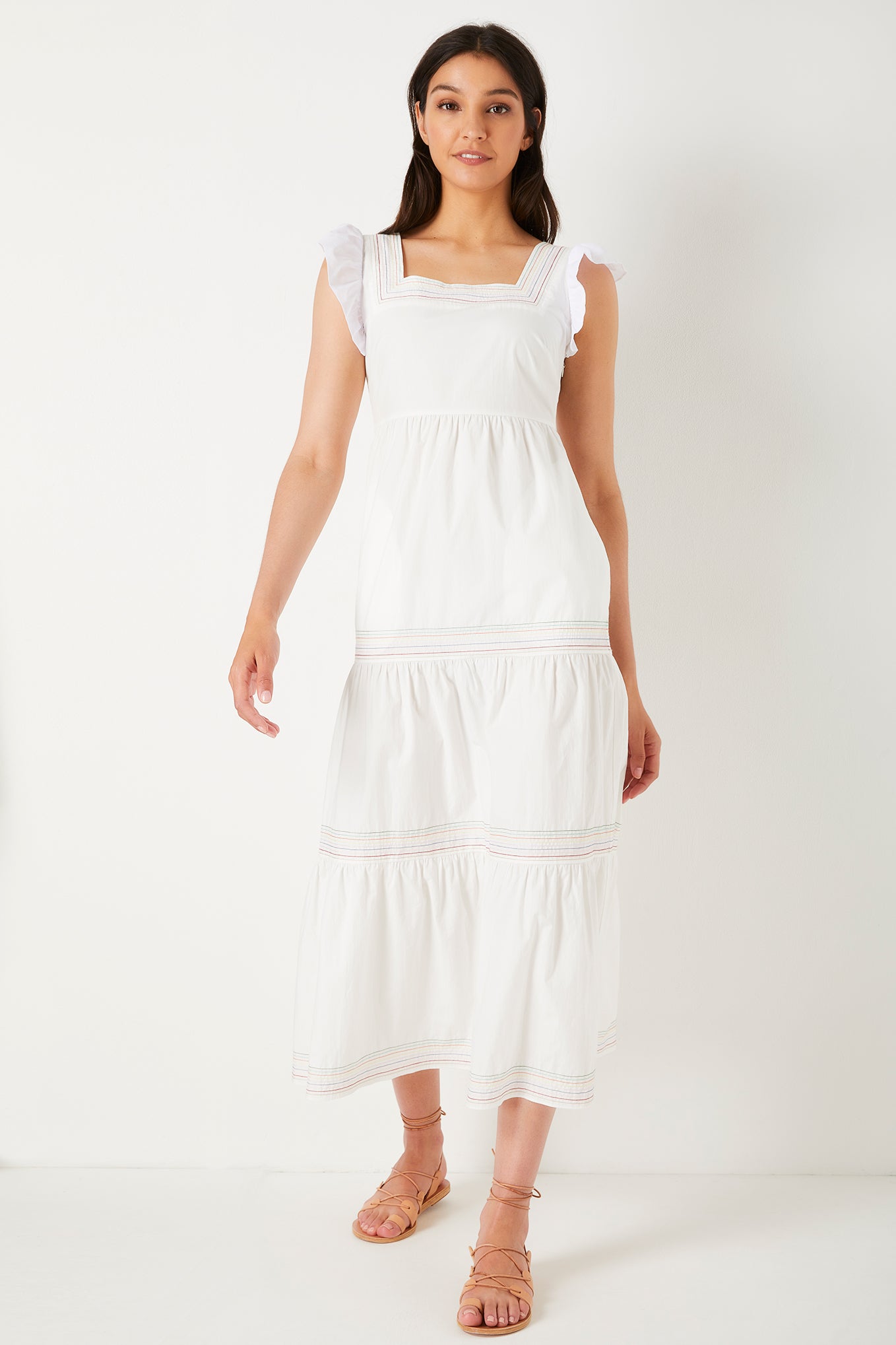 Elegant summer dress made of cotton fabric with a romantic look in white