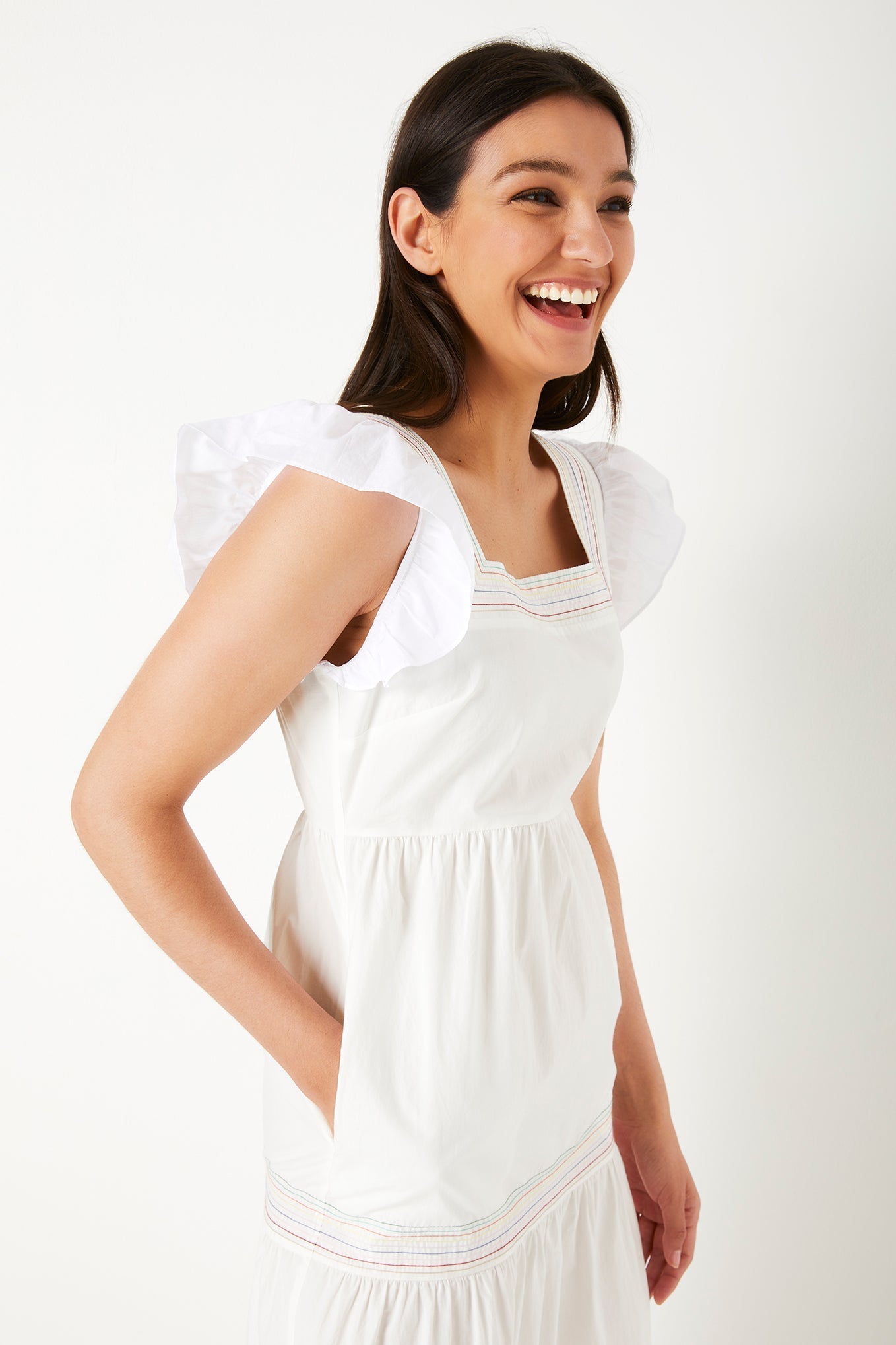 Elegant summer dress made of cotton fabric with a romantic look in white