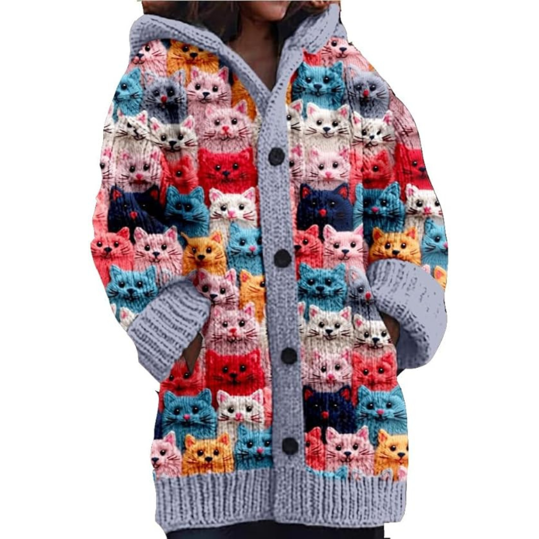 Warm knitted women's jacket with hoodie and cat pattern – stylish design, button closure, and feather insulation for a chilly day
