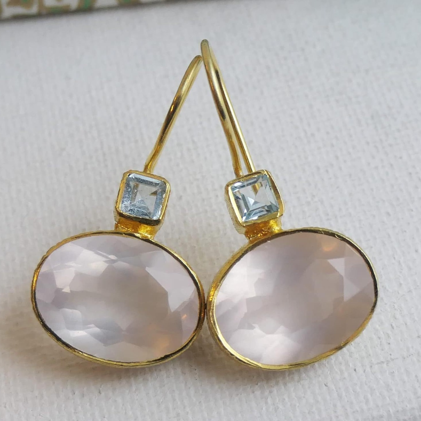 Vintage-style gold and green crystal earrings with coral pearl