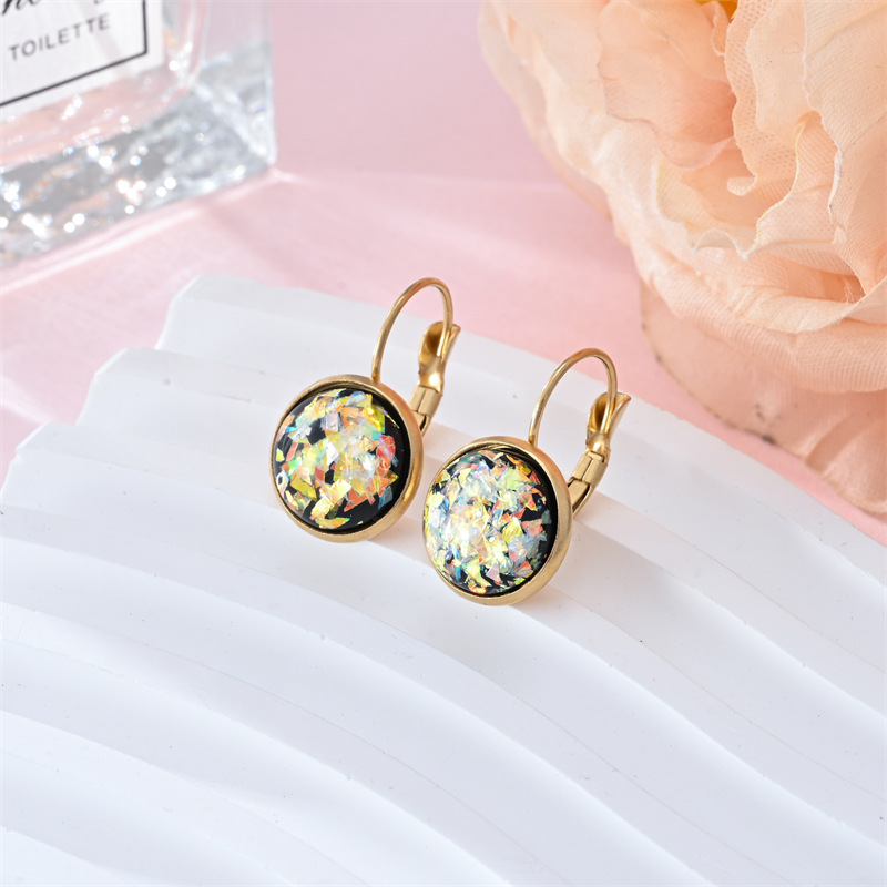 Stunning gold earrings with vintage opal stone by Ulani for a unique style experience