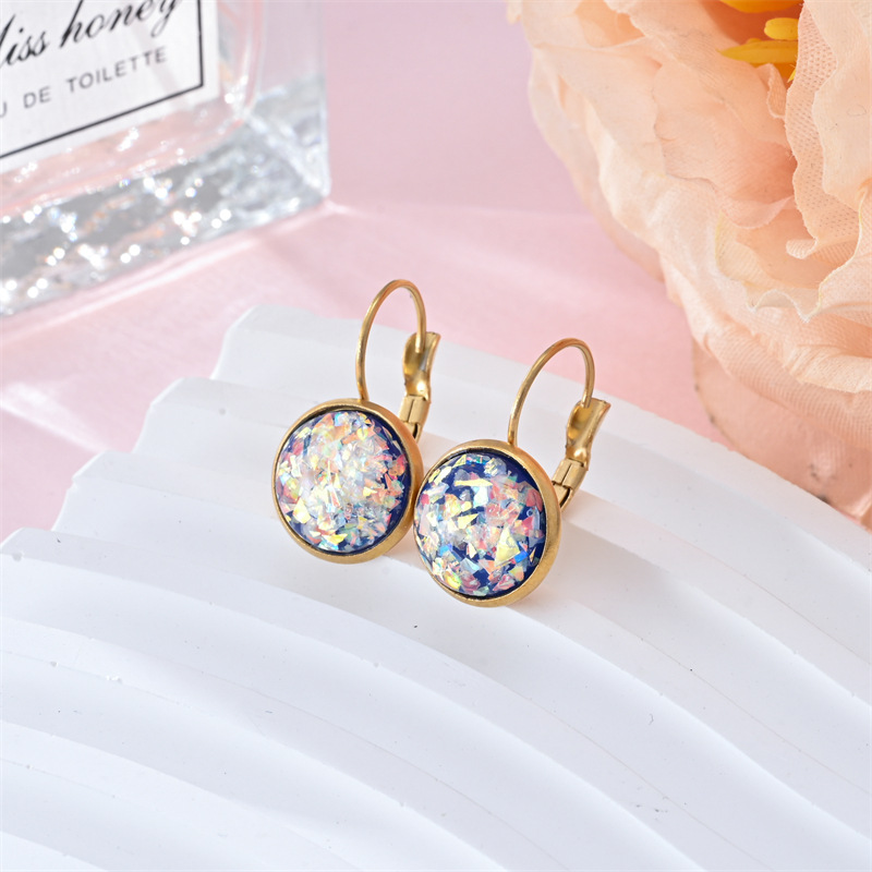 Stunning gold earrings with vintage opal stone by Ulani for a unique style experience