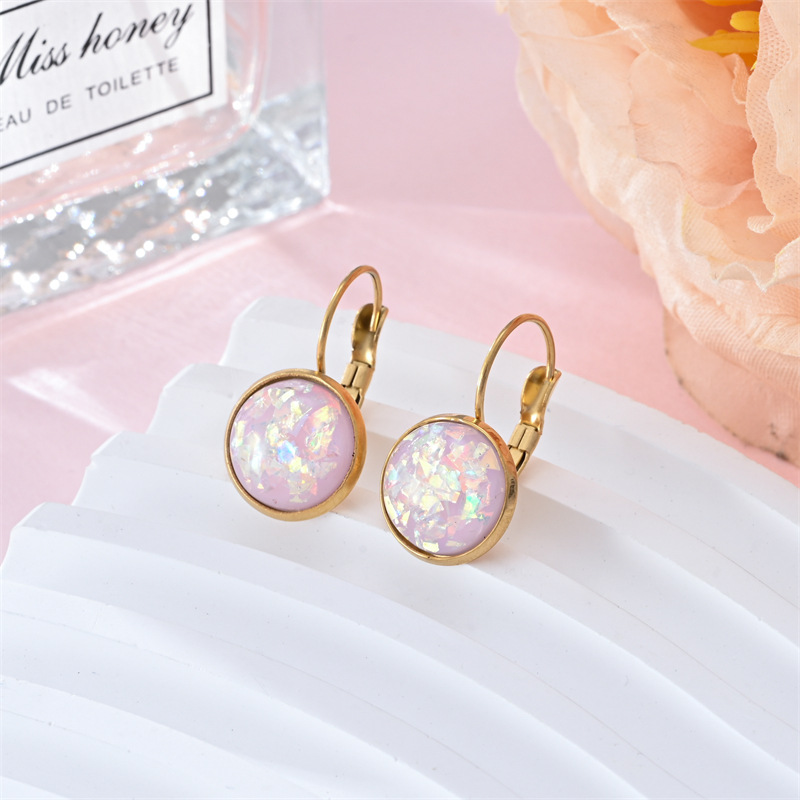 Stunning gold earrings with vintage opal stone by Ulani for a unique style experience