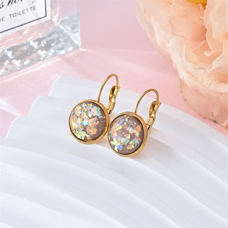Stunning gold earrings with vintage opal stone by Ulani for a unique style experience
