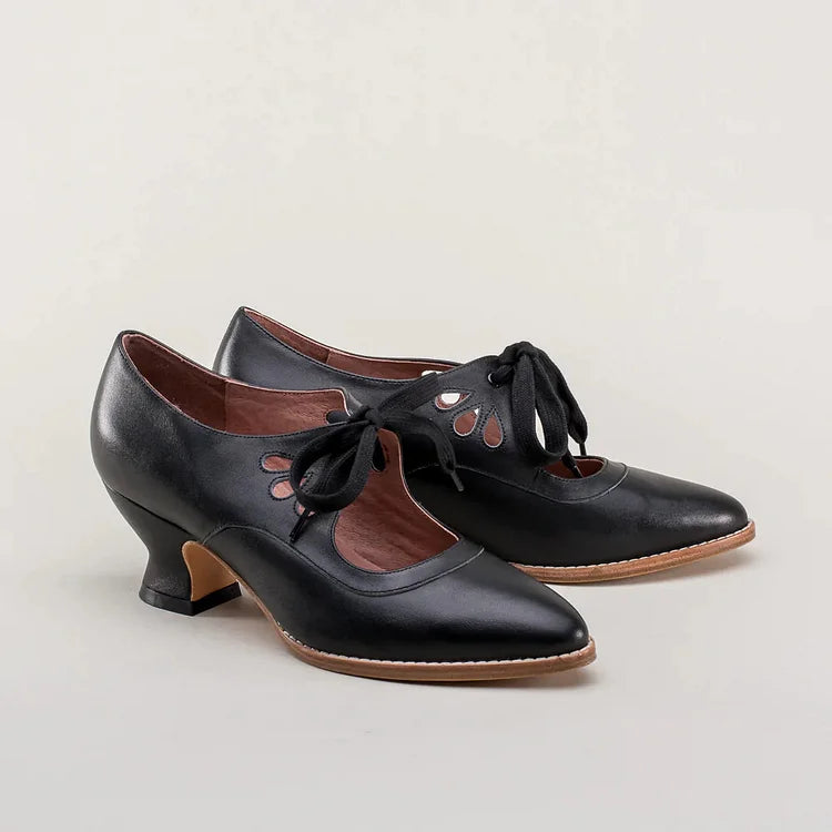 Elegant orthopedic leather shoes with high heel and original design
