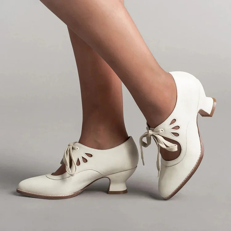 Elegant orthopedic leather shoes with high heel and original design