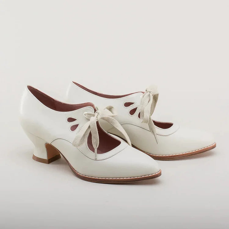 Elegant orthopedic leather shoes with high heel and original design