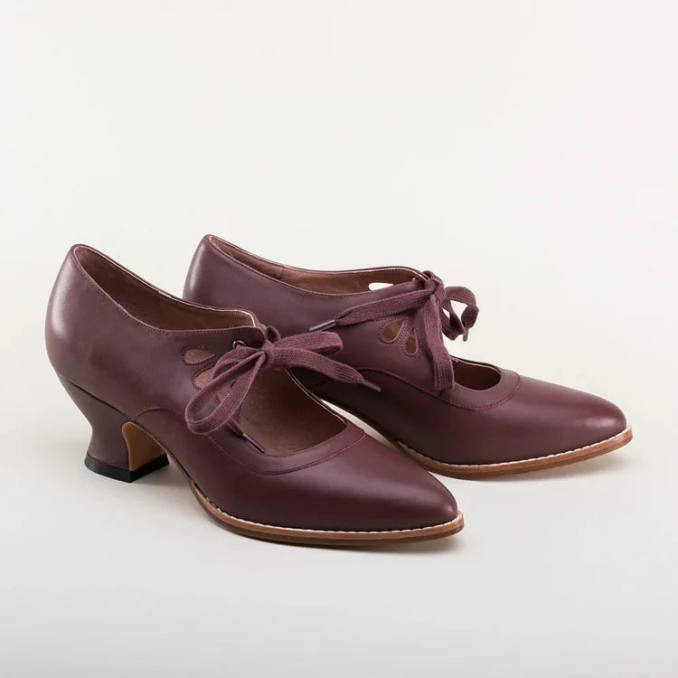 Elegant orthopedic leather shoes with high heel and original design