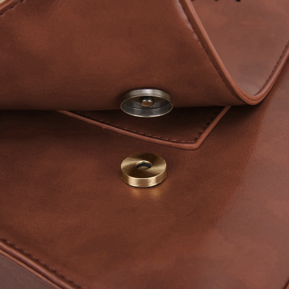 Fashionable bag with a unique and attractive feather ornament by Grace