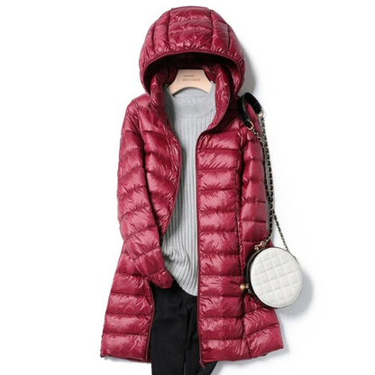 Long down jacket for women with a warm hood and maximum comfort