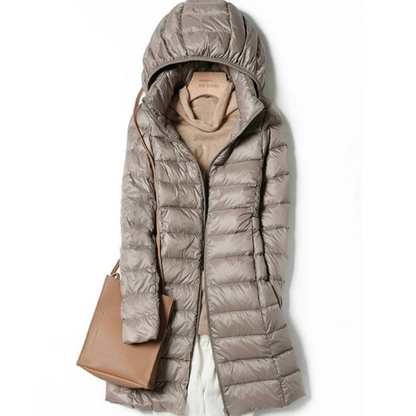 Long down jacket for women with a warm hood and maximum comfort