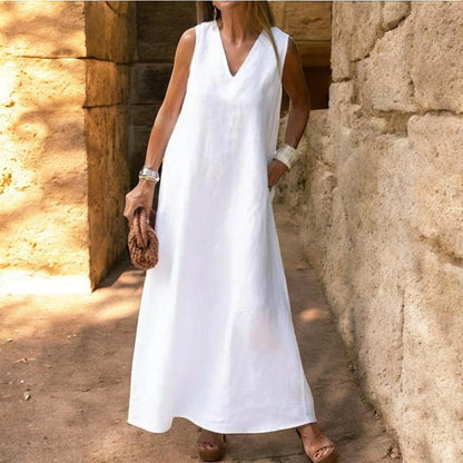 Elegant bohemian white cotton dress with V neckline and A-line hem sleeveless for a luxurious style