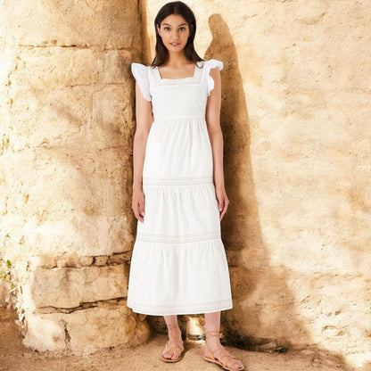 Elegant summer dress made of cotton fabric with a romantic look in white