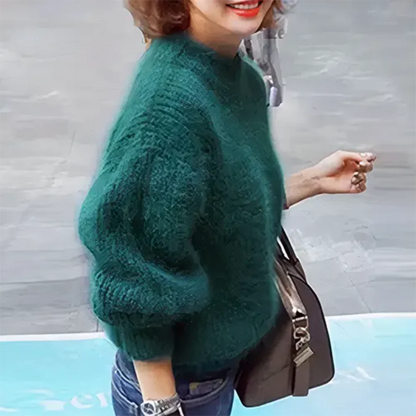 Elegant women's winter sweatshirt with long sleeves for warmth and comfort
