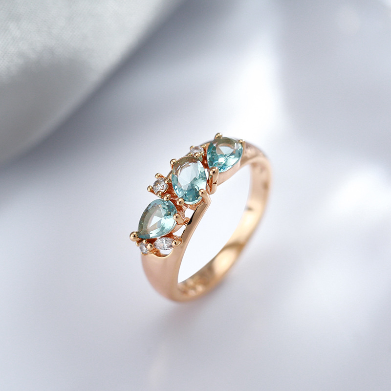 Ring with blue marquee rhinestone in luxurious gold design
