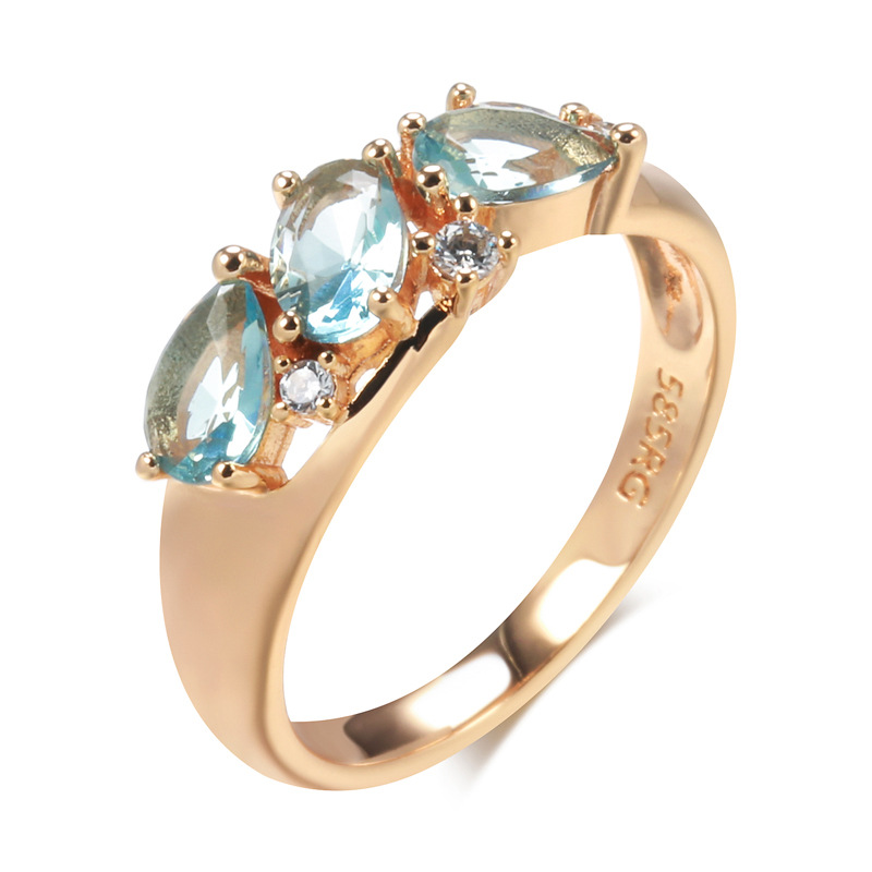 Ring with blue marquee rhinestone in luxurious gold design