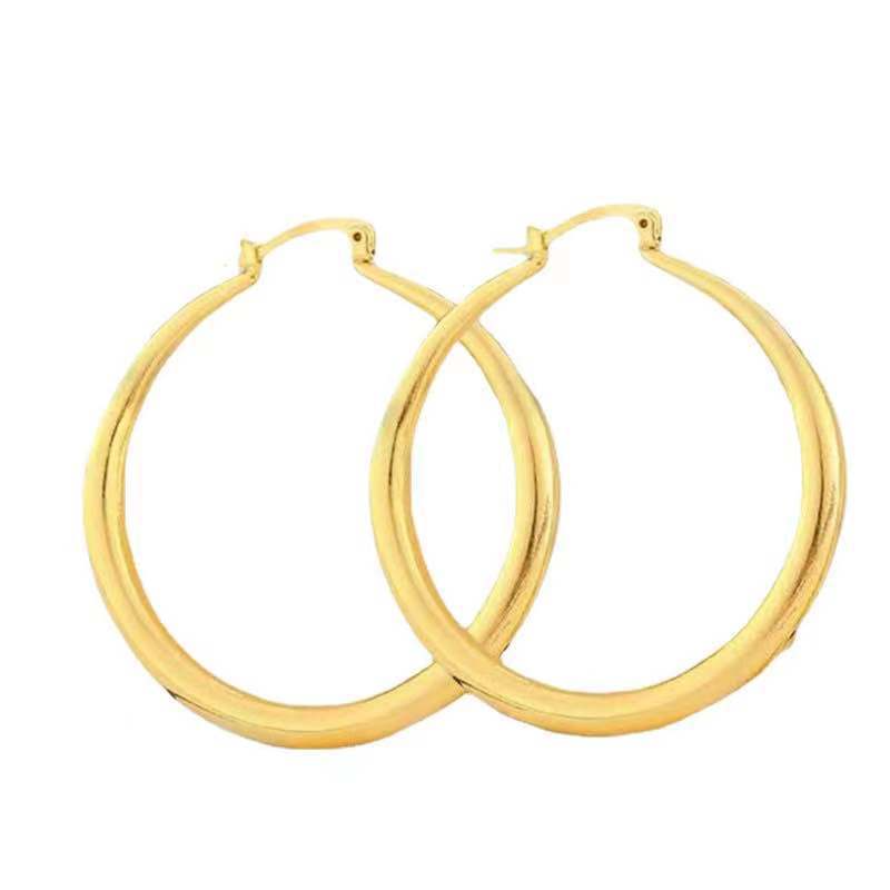 Fori-Hazi - Large sparkling hoop earrings in gold color for an uncompromising style