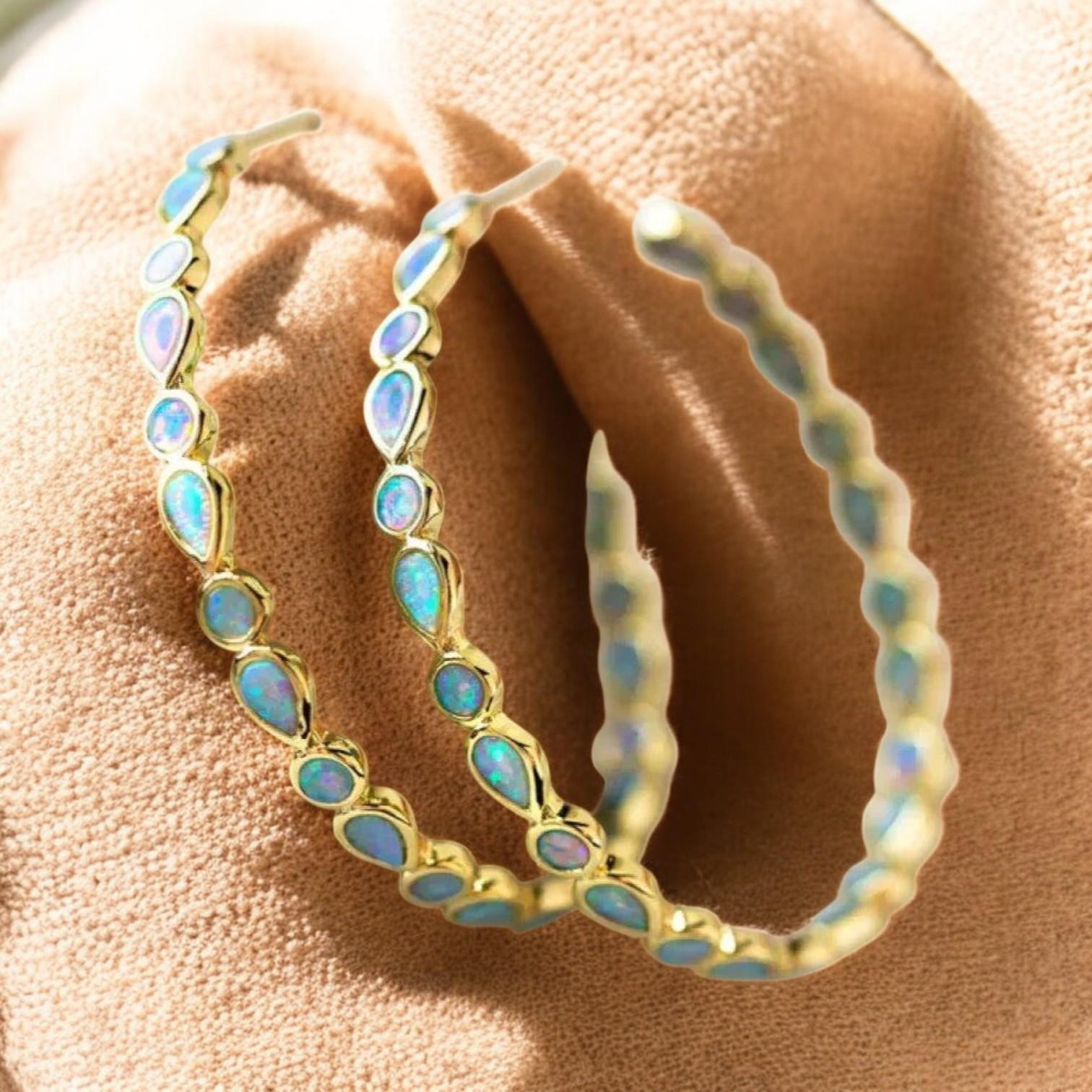 Gold hoop earrings with blue opal stone in a stunning vintage design named Emmeline