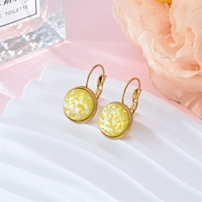 Stunning gold earrings with vintage opal stone by Ulani for a unique style experience