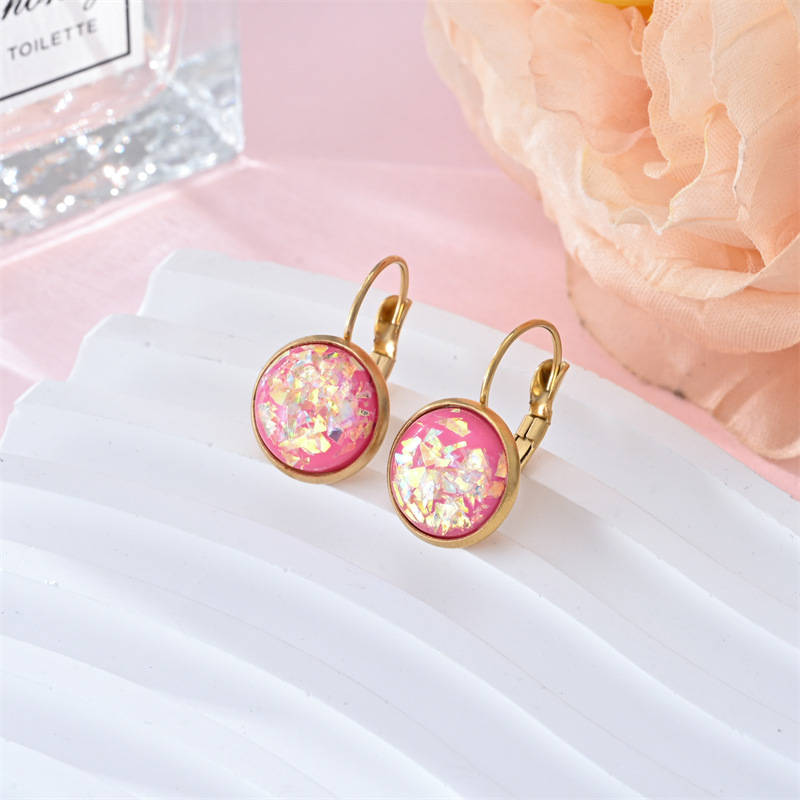 Stunning gold earrings with vintage opal stone by Ulani for a unique style experience