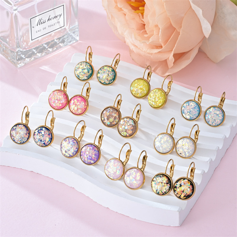 Stunning gold earrings with vintage opal stone by Ulani for a unique style experience