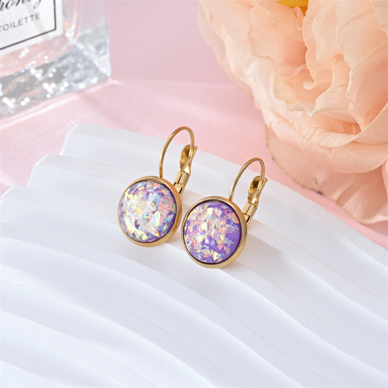 Stunning gold earrings with vintage opal stone by Ulani for a unique style experience