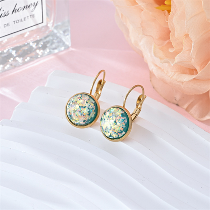 Stunning gold earrings with vintage opal stone by Ulani for a unique style experience