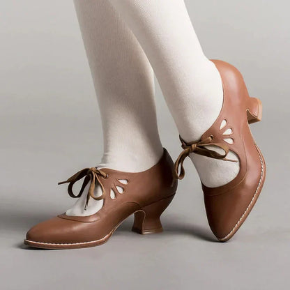 Elegant orthopedic leather shoes with high heel and original design