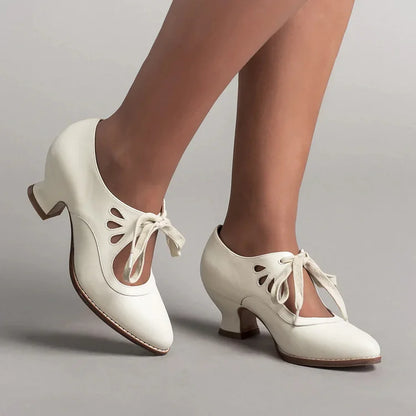 Elegant orthopedic leather shoes with high heel and original design