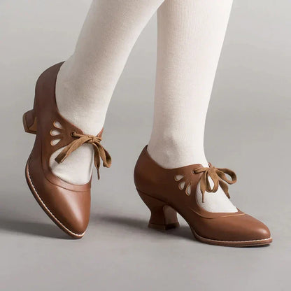 Elegant orthopedic leather shoes with high heel and original design