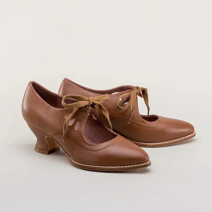 Elegant orthopedic leather shoes with high heel and original design