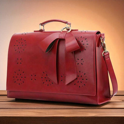 Fashionable bag with a unique and attractive feather ornament by Grace