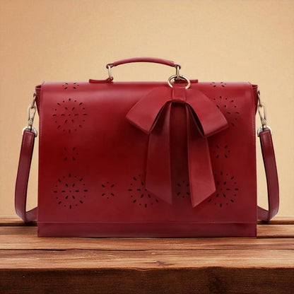 Fashionable bag with a unique and attractive feather ornament by Grace