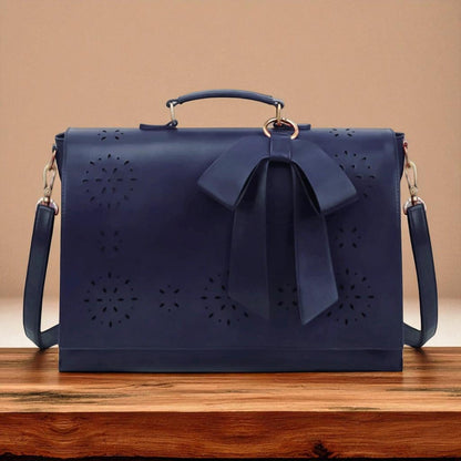 Fashionable bag with a unique and attractive feather ornament by Grace