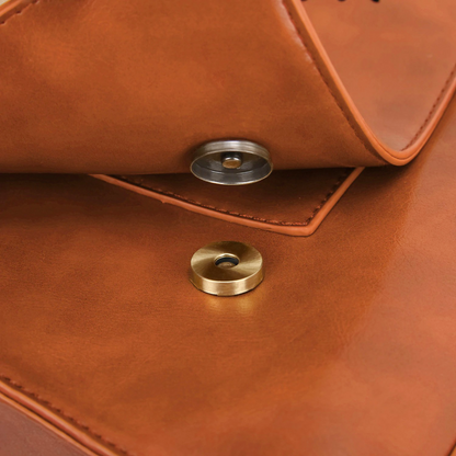 Fashionable bag with a unique and attractive feather ornament by Grace